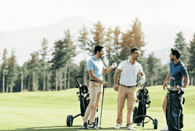 3 men playing golf