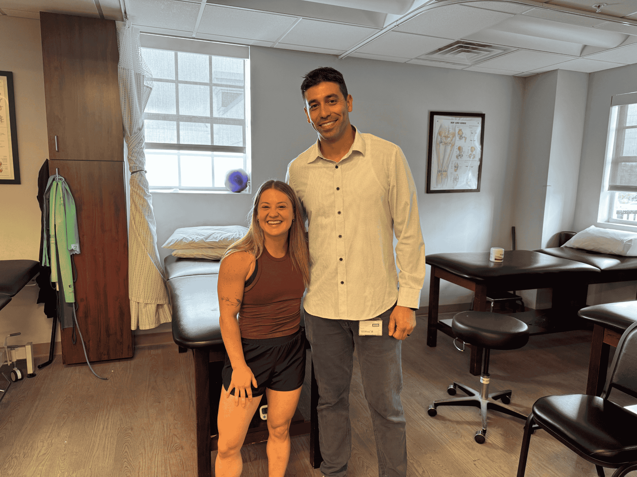 patient with her physical therapist