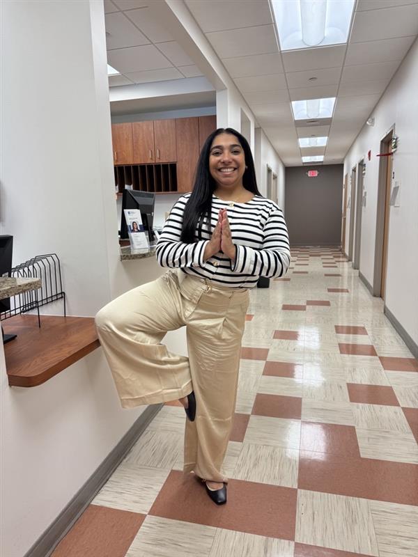 dr. bolos doing yoga pose