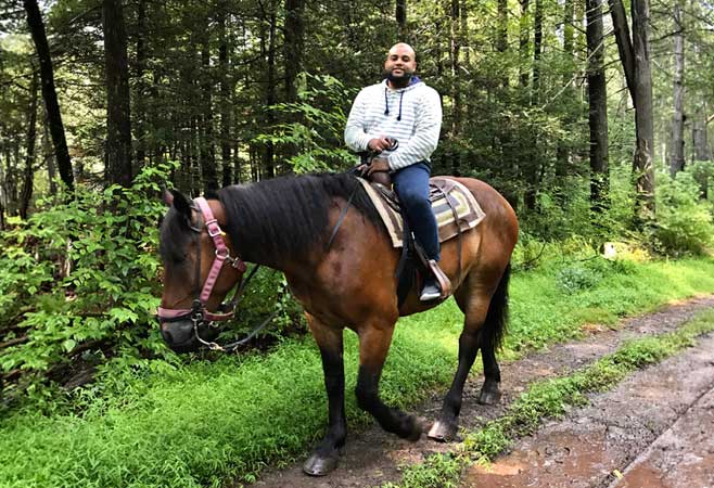Zakir Choudhury riding a horse