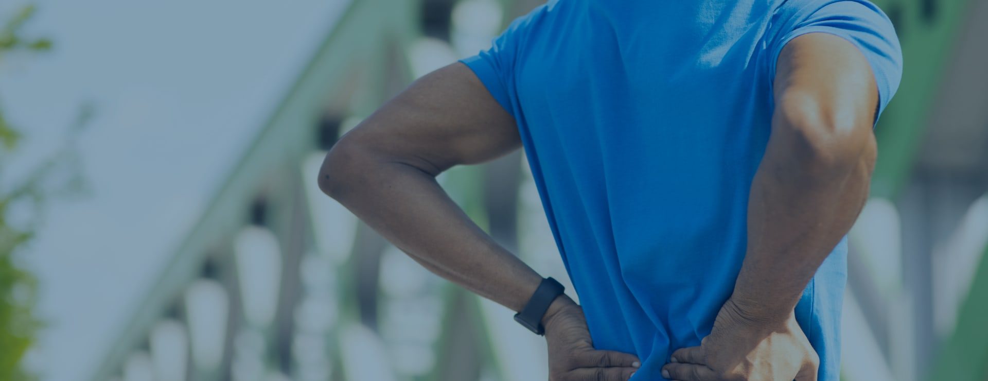 Man holding his back in pain