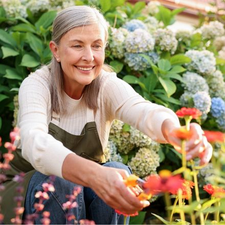 older woman gardening